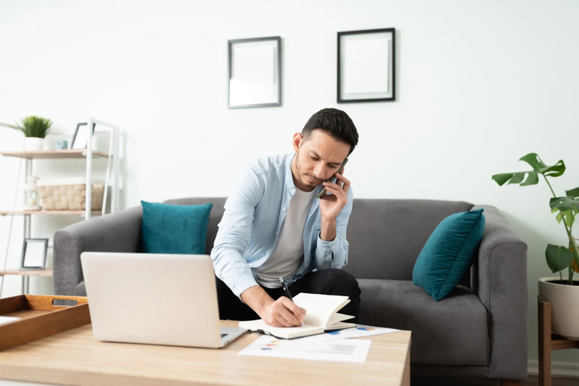 Business professional using a mobile phone in an office
