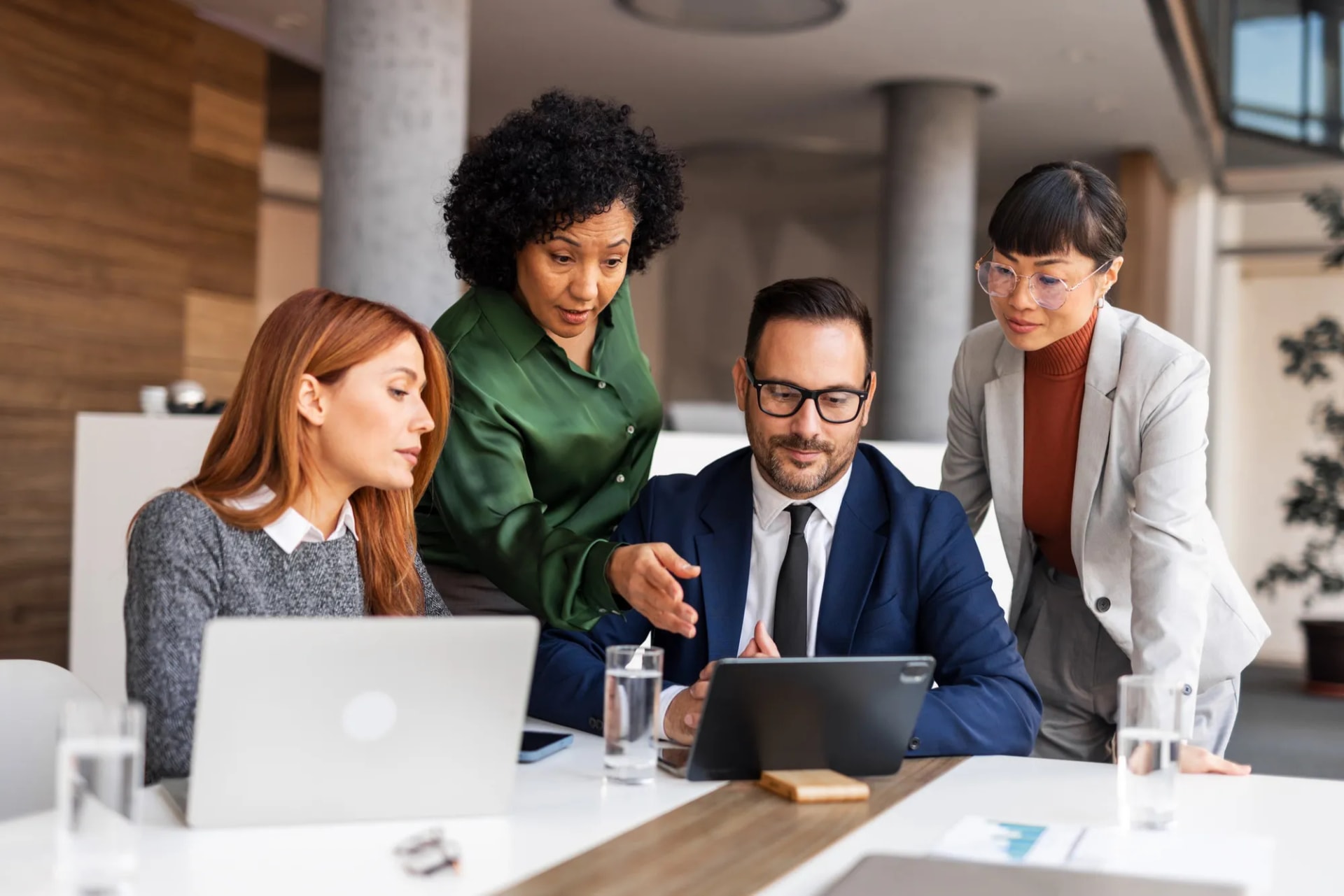 Business team coordinating multiple customer communication lines